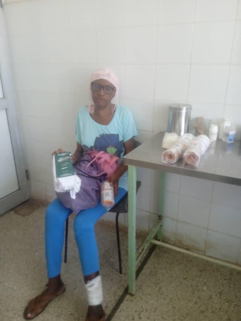 Woman receiving bandages and medical supplies through Cuba Compassion Project
