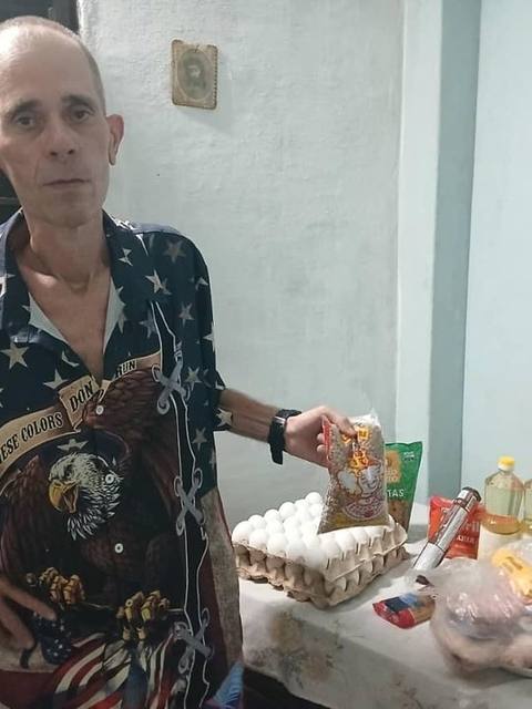 Family receiving rice, eggs, and oil through Cuba Compassion Project